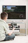 Boy Alone Playing Video Game